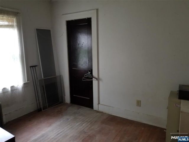 734 Broad St, Bloomfield, NJ 07003 - unfurnished bedroom featuring hardwood / wood-style flooring