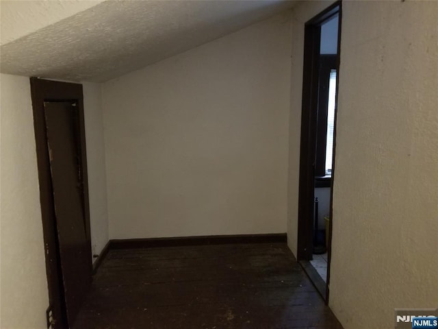 734 Broad St, Bloomfield, NJ 07003 - hallway with hardwood / wood-style flooring and a textured ceiling