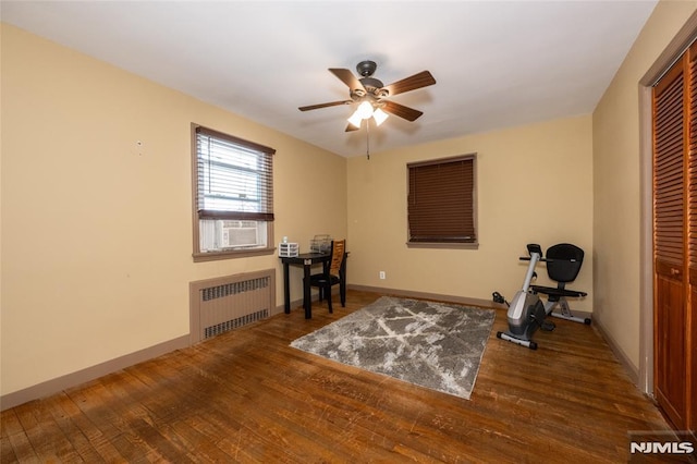 71 Pickens St, Little Ferry, NJ 07643 - workout room with radiator heating unit, a ceiling fan, wood finished floors, and cooling unit
