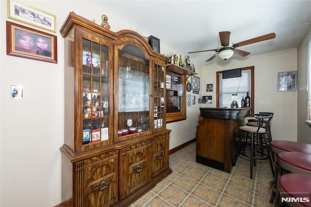 71 Pickens St, Little Ferry, NJ 07643 - indoor dry bar featuring ceiling fan and baseboards