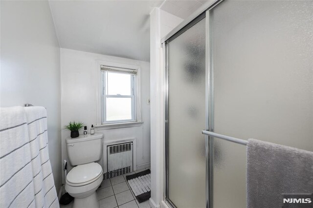 71 Pickens St, Little Ferry, NJ 07643 - bathroom featuring radiator heating unit, tile patterned flooring, and an enclosed shower