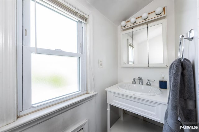 71 Pickens St, Little Ferry, NJ 07643 - bathroom with vanity and lofted ceiling