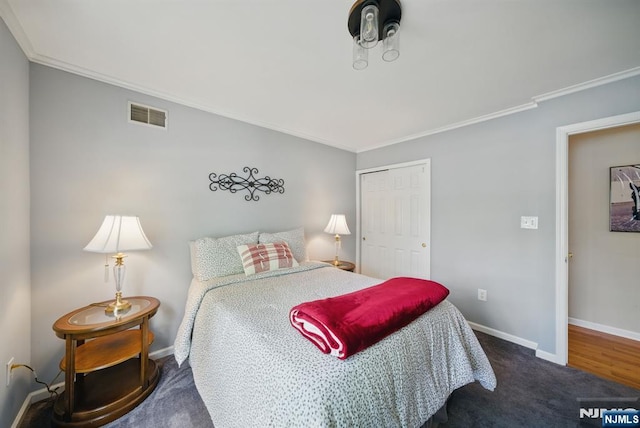 92 Maple Ln Unit 3021, Mount Arlington Boro, NJ 07856 - bedroom with crown molding, a closet, and carpet flooring