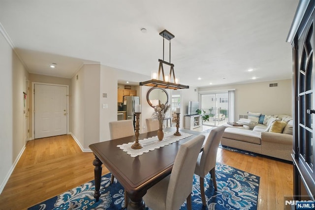 92 Maple Ln Unit 3021, Mount Arlington Boro, NJ 07856 - dining space with light wood-style floors, crown molding, and recessed lighting