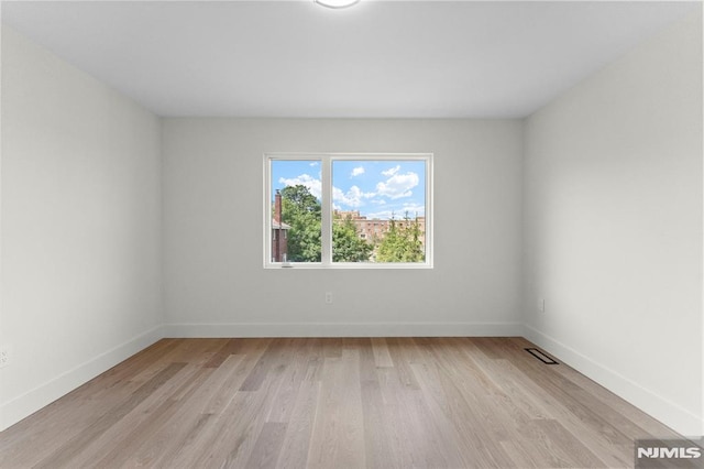 135 Old Palisade Rd, Fort Lee, NJ 07024 - empty room featuring light wood finished floors and baseboards