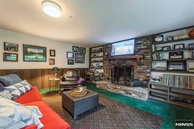 117 Morton Dr, Ramsey, NJ 07446 - living room featuring carpet, a brick fireplace, a wainscoted wall, and wooden walls