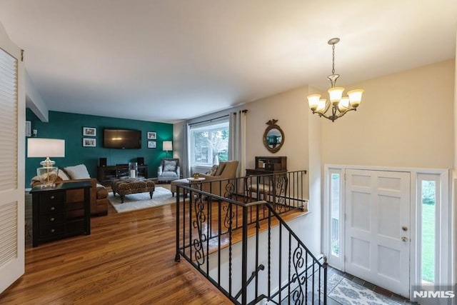 117 Morton Dr, Ramsey, NJ 07446 - entryway featuring a chandelier and wood finished floors