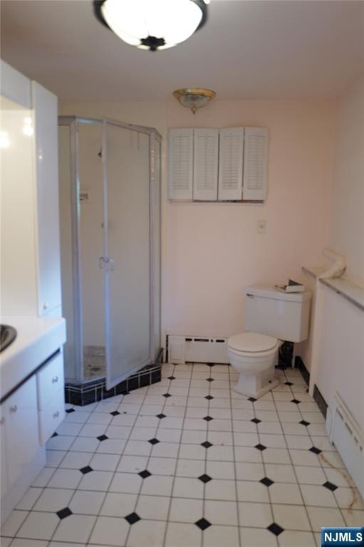 106 Prescott St, Demarest, NJ 07627 - bathroom featuring a baseboard radiator, a stall shower, and vanity