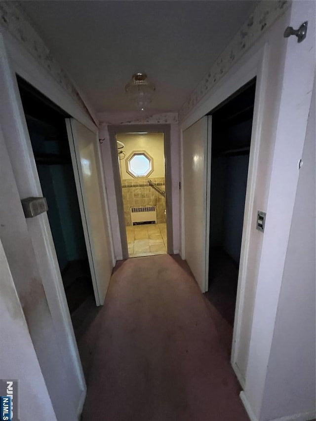 106 Prescott St, Demarest, NJ 07627 - hallway with radiator heating unit and light carpet