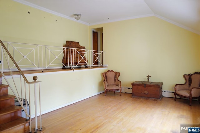 106 Prescott St, Demarest, NJ 07627 - unfurnished room with wood finished floors, a baseboard radiator, crown molding, and lofted ceiling
