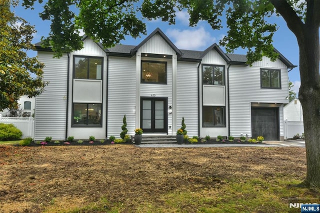 415 Bailey Rd, Paramus, NJ 07652 - modern farmhouse featuring board and batten siding, a garage, and french doors