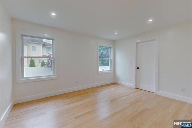 415 Bailey Rd, Paramus, NJ 07652 - spare room featuring healthy amount of natural light, wood finished floors, and recessed lighting