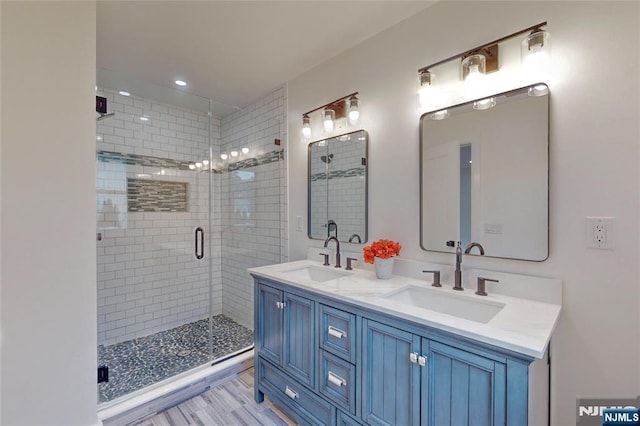 415 Bailey Rd, Paramus, NJ 07652 - full bathroom featuring a shower stall, double vanity, and recessed lighting