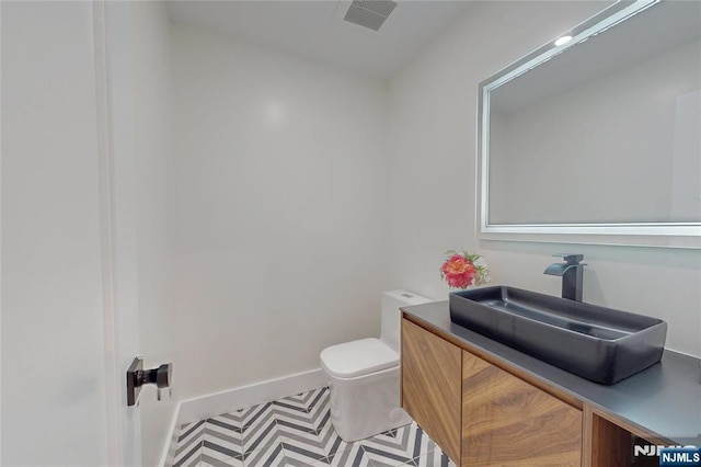 415 Bailey Rd, Paramus, NJ 07652 - bathroom with toilet and vanity