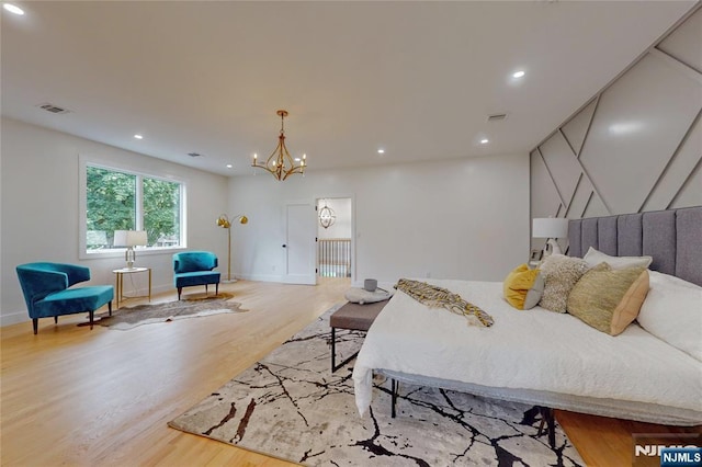 415 Bailey Rd, Paramus, NJ 07652 - bedroom with wood finished floors, a chandelier, and recessed lighting