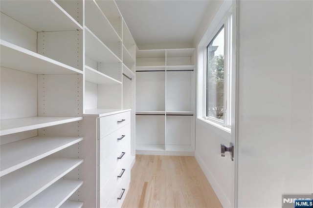 415 Bailey Rd, Paramus, NJ 07652 - walk in closet featuring light wood-type flooring