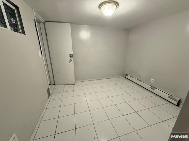 1 9th Ave, East Orange, NJ 07018 - unfurnished room featuring a baseboard heating unit