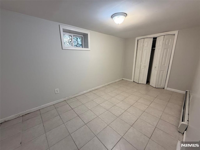 1 9th Ave, East Orange, NJ 07018 - unfurnished bedroom featuring light tile patterned flooring and a closet