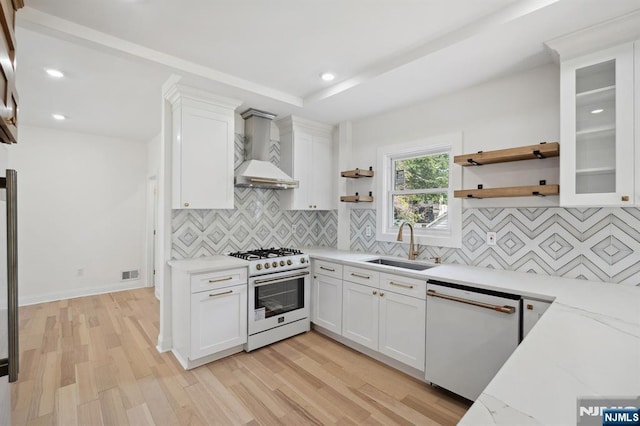 26 Lake, North Haledon, NJ 07508 - kitchen with white appliances, wall chimney exhaust hood, open shelves, light wood-type flooring, and white cabinetry