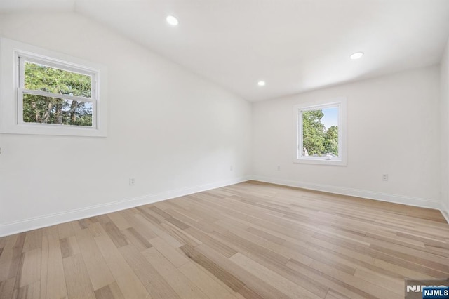 26 Lake, North Haledon, NJ 07508 - unfurnished room featuring light wood finished floors, vaulted ceiling, and recessed lighting