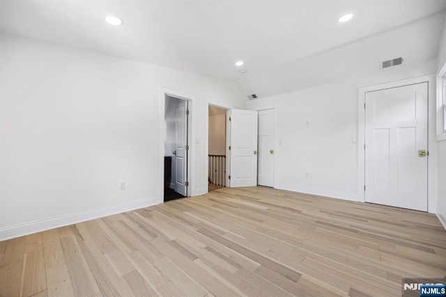 26 Lake, North Haledon, NJ 07508 - unfurnished bedroom featuring light wood finished floors, recessed lighting, and vaulted ceiling