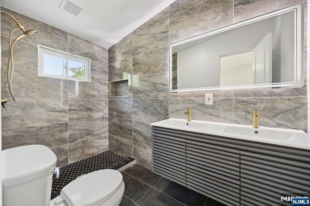 26 Lake, North Haledon, NJ 07508 - full bath with tile walls, a tile shower, tile patterned flooring, and double vanity
