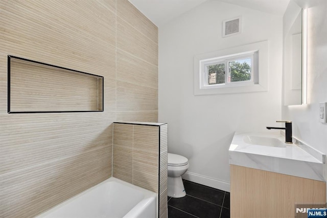 26 Lake, North Haledon, NJ 07508 - bathroom with tile patterned floors, vanity, a bath, and vaulted ceiling