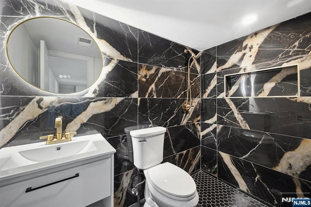 26 Lake, North Haledon, NJ 07508 - bathroom with vanity, tile walls, and tiled shower