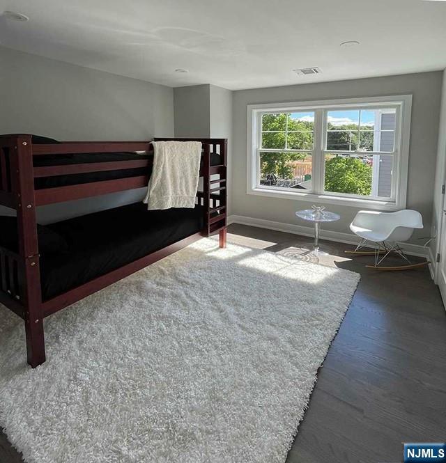25 Division St Unit 403, Cresskill, NJ 07626 - bedroom featuring baseboards and wood finished floors