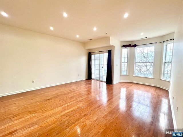 200 Dey St Unit 282, Harrison, NJ 07029 - unfurnished room with light wood-style floors and recessed lighting