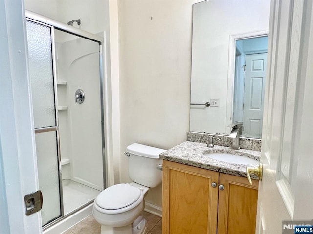 200 Dey St Unit 282, Harrison, NJ 07029 - full bath featuring a shower stall, vanity, and tile patterned flooring