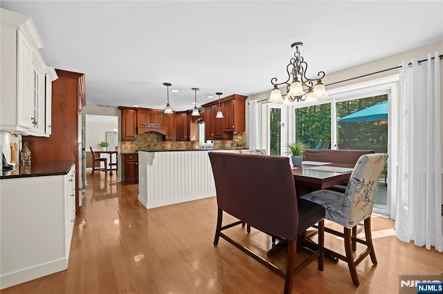 8 Fieldstone Dr, Kinnelon Borough, NJ 07405 - dining space featuring a chandelier, light wood-type flooring, and recessed lighting