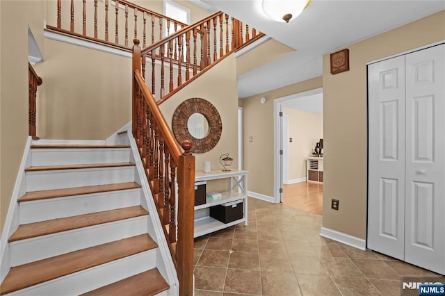 8 Fieldstone Dr, Kinnelon Borough, NJ 07405 - stairs with baseboards and tile patterned floors
