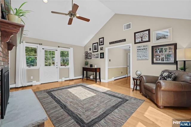 8 Fieldstone Dr, Kinnelon Borough, NJ 07405 - living room featuring high vaulted ceiling, baseboard heating, a ceiling fan, and wood finished floors