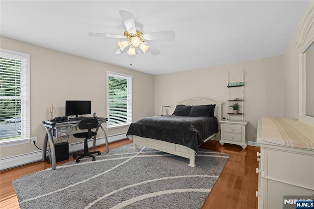 8 Fieldstone Dr, Kinnelon Borough, NJ 07405 - bedroom featuring wood finished floors, an office area, and ceiling fan