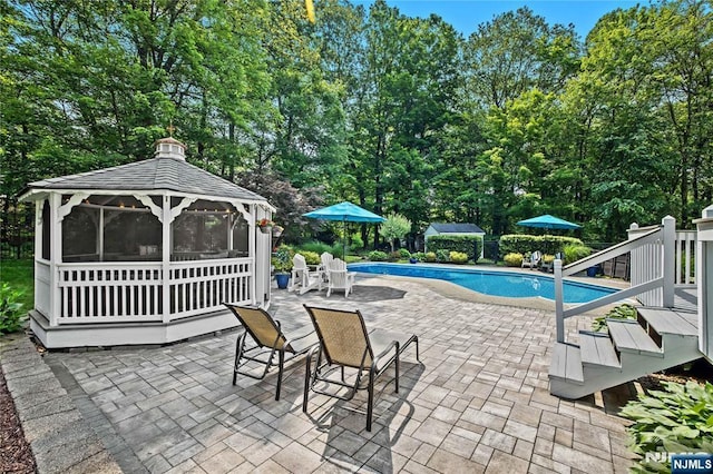 8 Fieldstone Dr, Kinnelon Borough, NJ 07405 - view of swimming pool with a patio, a gazebo, and view of wooded area