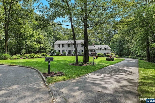 8 Fieldstone Dr, Kinnelon Borough, NJ 07405 - colonial house featuring a front lawn