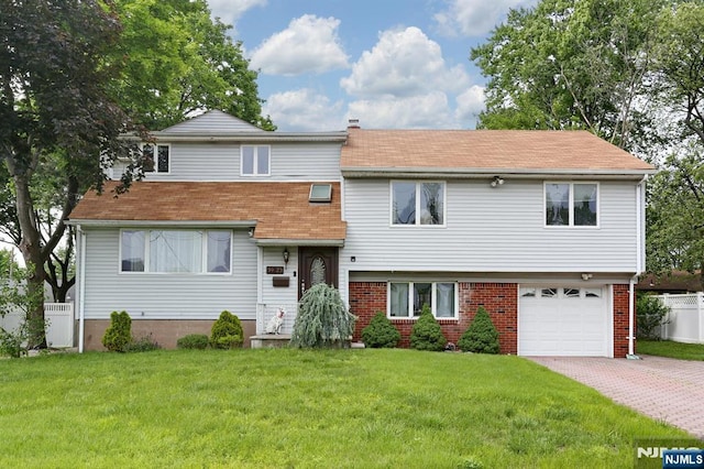 39-23 Pershing St, Fair Lawn, NJ 07410 - view of front of home with decorative driveway, a garage, roof with shingles, and brick siding