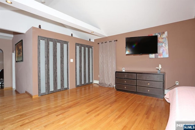 39-23 Pershing St, Fair Lawn, NJ 07410 - living room featuring vaulted ceiling and wood finished floors