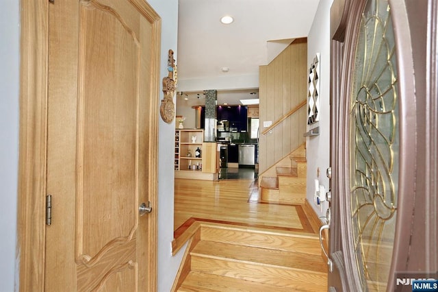 39-23 Pershing St, Fair Lawn, NJ 07410 - foyer with stairway and light wood-style floors