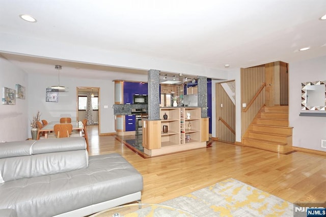 39-23 Pershing St, Fair Lawn, NJ 07410 - living room with stairway, light wood-type flooring, and recessed lighting
