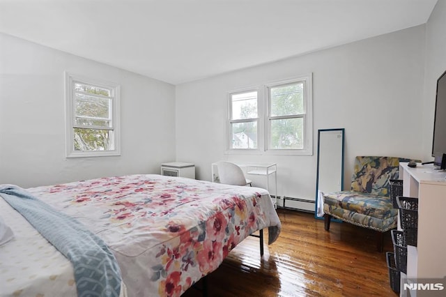 2 Ann St, Bloomingdale, NJ 07403 - bedroom with hardwood / wood-style flooring and a baseboard radiator