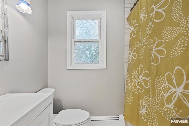 2 Ann St, Bloomingdale, NJ 07403 - full bathroom with baseboard heating, a shower with shower curtain, and vanity