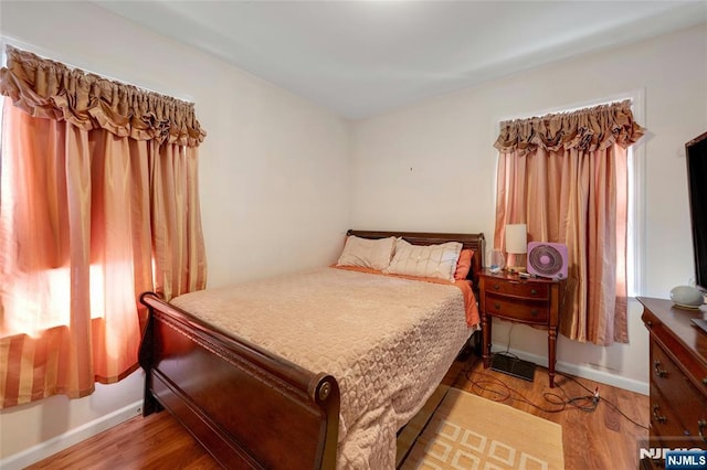 116 Berkeley Ave, Bloomfield, NJ 07003 - bedroom featuring wood finished floors and multiple windows