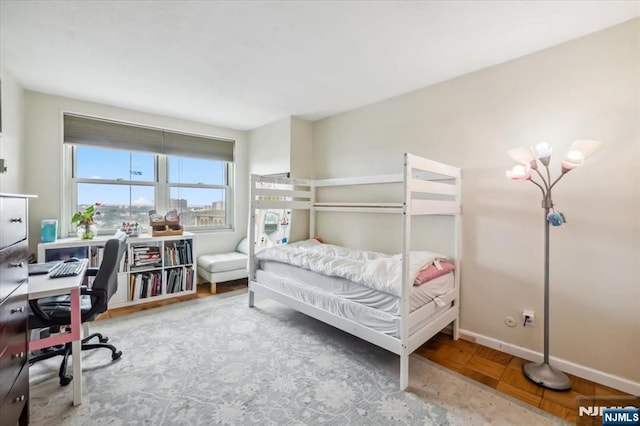 555 N Ave Unit 23C, Fort Lee, NJ 07024 - bedroom featuring a desk and baseboards