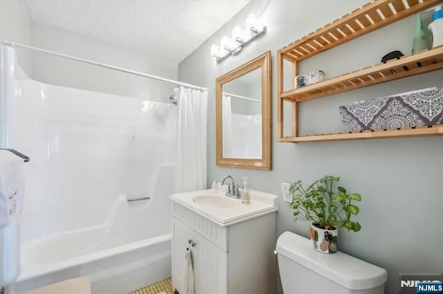 555 N Ave Unit 23C, Fort Lee, NJ 07024 - bathroom featuring vanity, shower / bath combo with shower curtain, and a textured ceiling