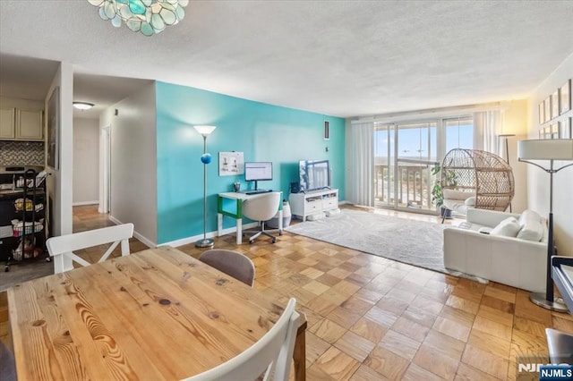 555 N Ave Unit 23C, Fort Lee, NJ 07024 - dining space with a textured ceiling