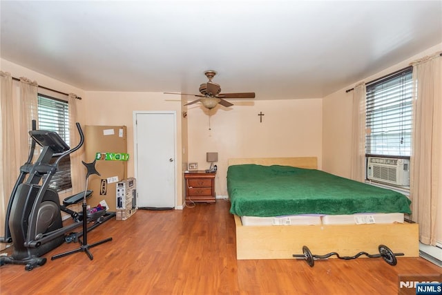 23 Preston St, Ridgefield Park, NJ 07660 - bedroom with cooling unit, wood finished floors, and a ceiling fan