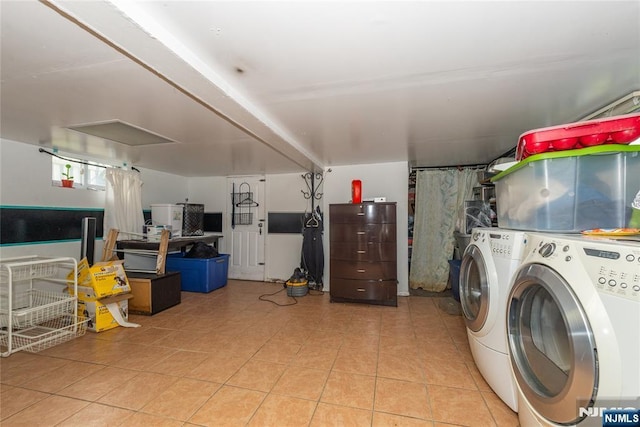 23 Preston St, Ridgefield Park, NJ 07660 - washroom with separate washer and dryer and light tile patterned floors