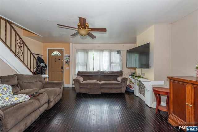 23 Preston St, Ridgefield Park, NJ 07660 - living room with dark wood finished floors, stairway, and ceiling fan